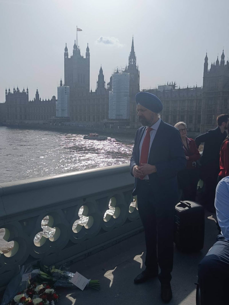 Tan Dhesi by Westminster Bridge memorial