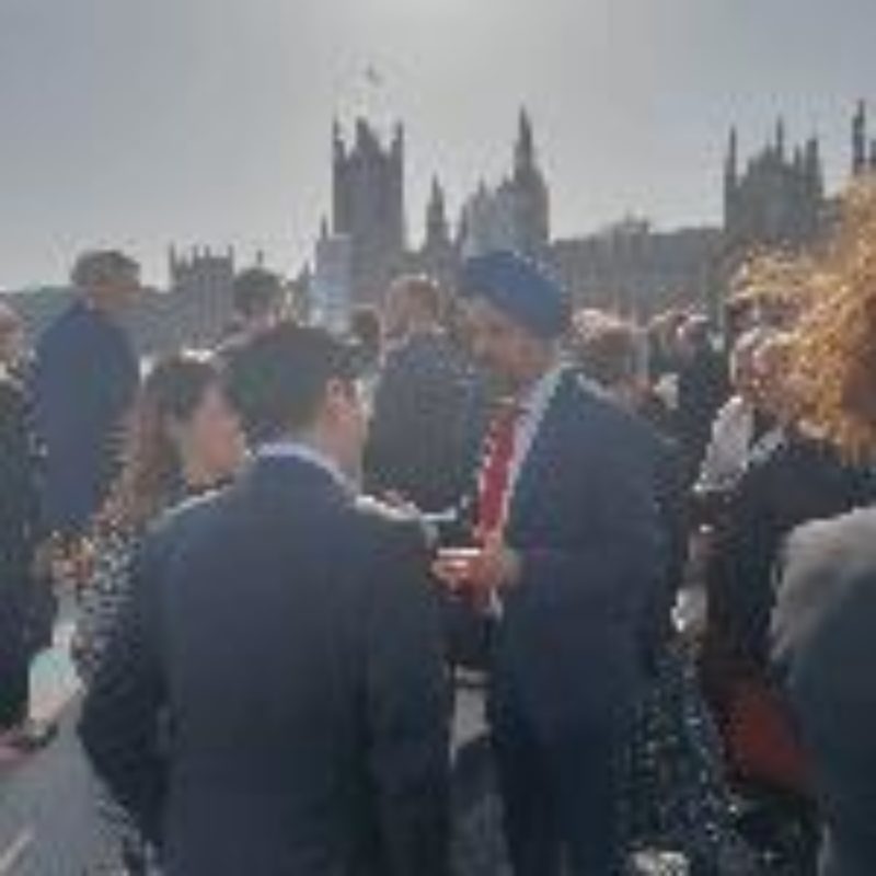 Tan Dhesi speaking with others