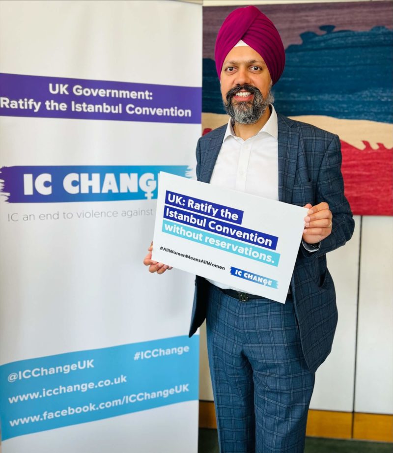 Tan Dhesi standing with a sign calling for the UK to ratify the Istanbul Convention