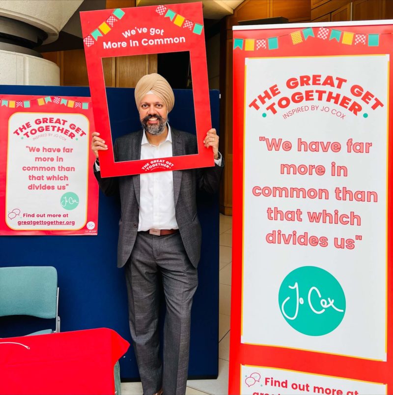 Tan Dhesi posing with a More in Common sign